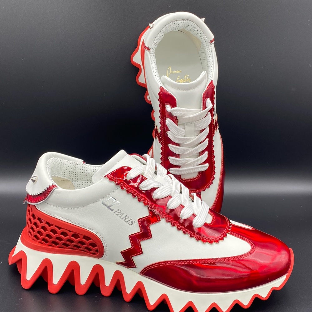 Christian Louboutin “Loubishark Donna” leather and neoprene runner sneakers.